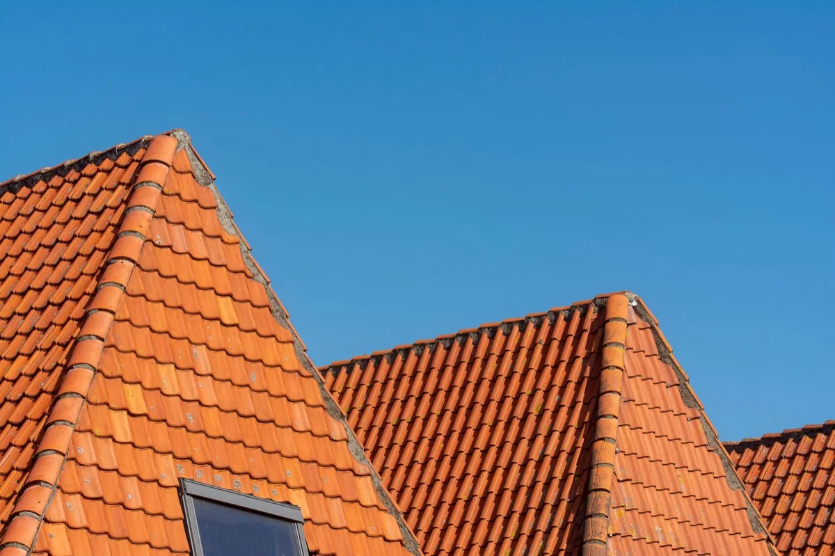 Clay barrel tile rooflines on homes in Grand Forks, ND
